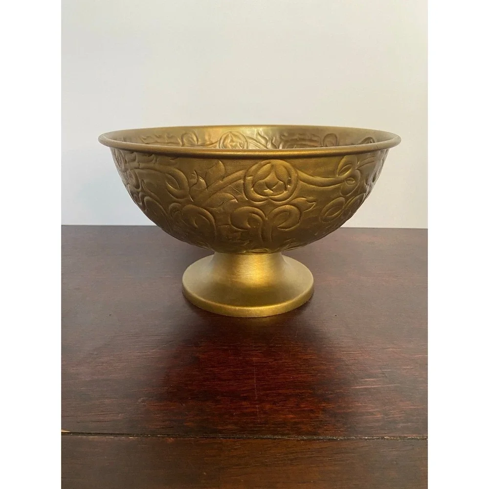 Gold colored pedestal bowl